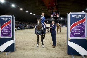 Ahlmann Christian, (GER), Taloubet Z receiving a Longines watch from Mr Stefaan d'Hondt (Brand Manager Longines Belux) Longines FEI World Cup presented by Landrover Vlaanderen Kerstjumping - Memorial Eric Wauters - Mechelen 2015 Pic Dirk Caremans